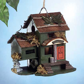 A birdhouse that's shaped like a bed & breakfast. birdie-bed-and-breakfast-house.jpg
