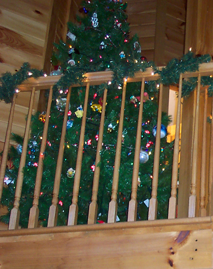 Log Cabin Homes Adorned With Holiday Lights & Christmas Decorations