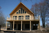 exterior-wall-of-log-home-basement.jpg