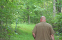 Jim exploring the wooded property... it had a lot of personality.