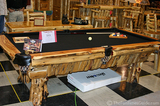 This pool table would be perfect inside a log home!