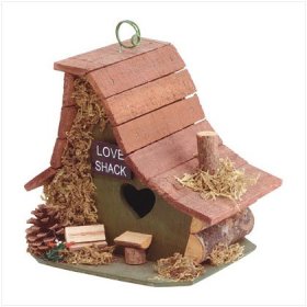 A birdhouse that's built like a love shack log cabin. love-shack-bird-house.jpg