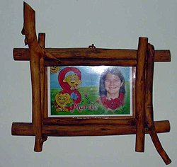 A picture frame made from chunky sticks. picture-frame-made-from-real-sticks.jpg