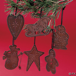 Rust colored tin metal ornaments in Christmas shapes. rust-colored-tin-metal-ornaments.jpg