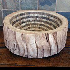 A tree trunk log sink that would be great for a log cabin or log home. sink-basin-shaped-like-a-log.jpg