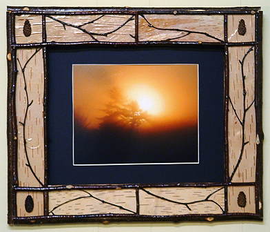 A really nice picture frame made from sticks and tiny twigs. twig-and-stick-photo-frame.jpg