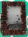 A picture frame made from broken sticks or twigs. twig-art-photo-frame-made-from-broken-sticks.gif