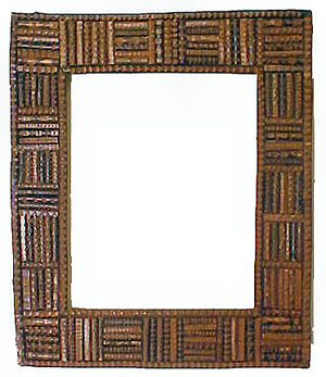 A mosaic photo frame made from pieces of sticks and twigs. twig-mosaic-picture-frame.jpg