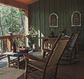 green-log-walls-on-porch-of-log-home.jpg