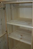 A look inside the 2-shelf wardrober... notice the hanging rack.