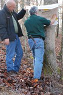 jim-and-john-hanging-building-permit.jpg