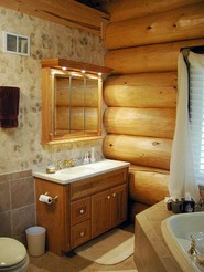 log-bathroom-with-wallpaper-tiled-wall.jpg