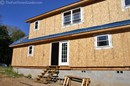 log-home-with-blue-tin-roof.jpg