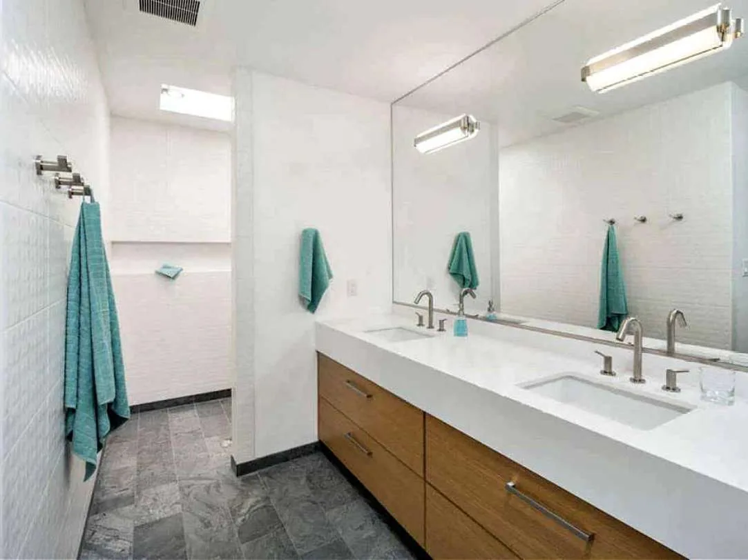 An example of a large walk-in shower without any doors in the master bathroom -- as seen in a brochure.