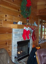 stockings-hung-over-fireplace-mantel-log-home.jpg