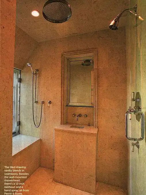 Here's a small sink with a fogless mirror for shaving and brushing teeth in the shower -- as seen in This Old House magazine, May 2005.