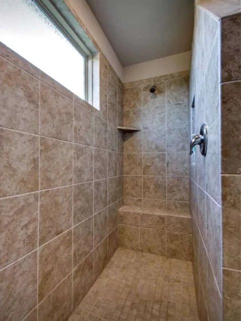 Here's another tiled walk-in shower without a door that we used as an example when designing our master bathroom.