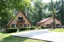 There were so many interesting parts to this house... the windows, the balconies, the storage shed, the 3-car garage -- complete with workshop, gameroom & party bar!